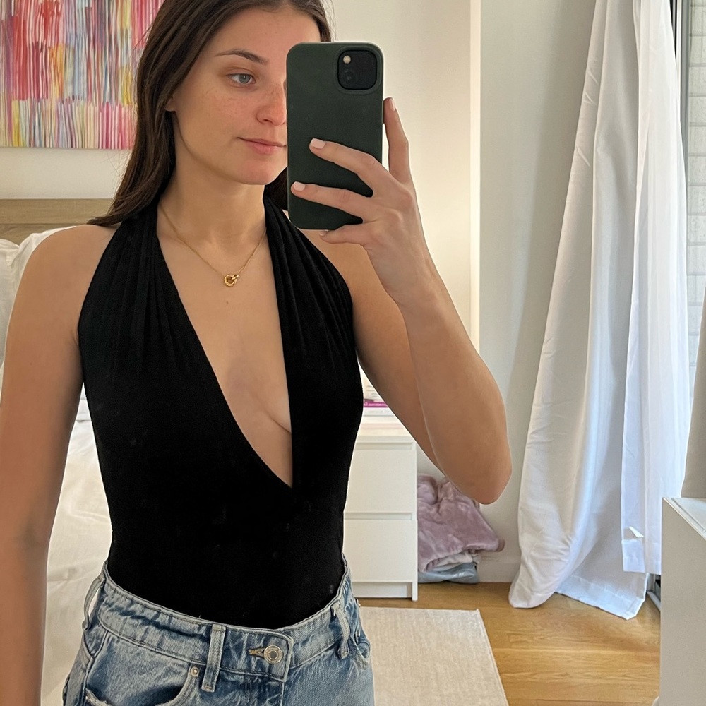 LULUs Black deep v neck body suit. Size x small. Great material. Very flattering